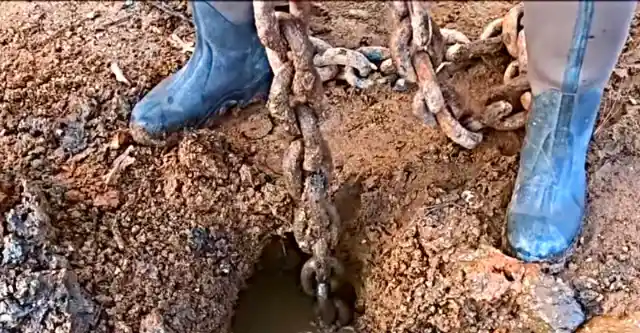 Man Finds Old Buried Chain, Then Gut Tells Him To Keep Pulling, Look Closer