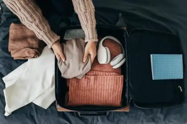 Mom Asks Neighbor To Help With Heavy Suitcase, Gut Tells Him To Open It