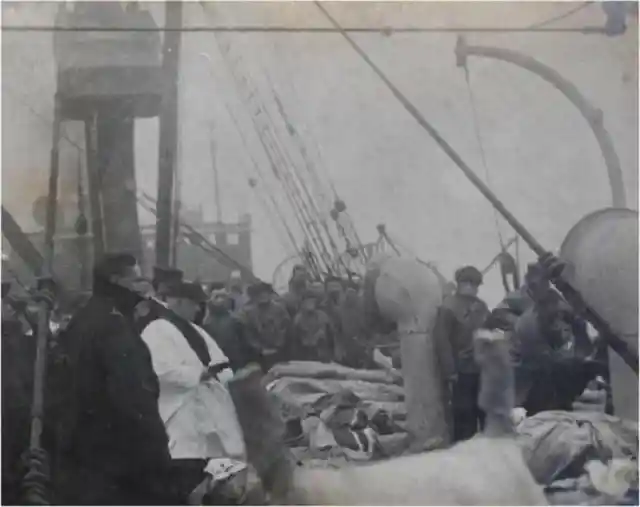 A Priest Praying Over The Victims of the Titanic (1912)