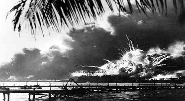 28. Destroyer USS Shaw exploding during the Japanese attack on Pearl Harbor, December 7, 1941.