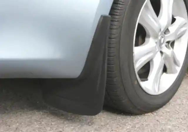 What is the skirt guard that some cars and trucks place behind their wheels?