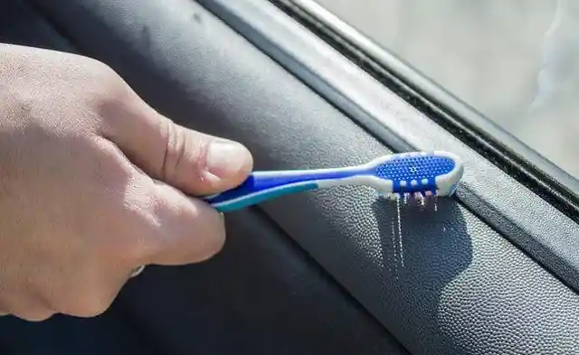 Clean the buttons on the dashboard with a flathead screwdriver.