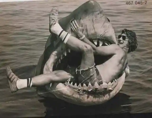 39. Steven Spielberg sits in the mouth of the mechanical shark used in his movie, Jaws.