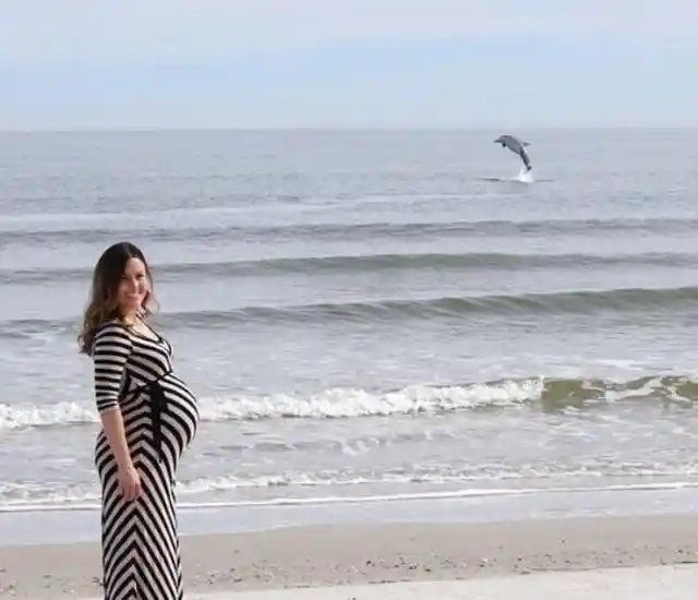 Man Was Taking Photos Of His Pregnant Wife When Suddenly He Saw A Strange Creature Emerging From The Sea