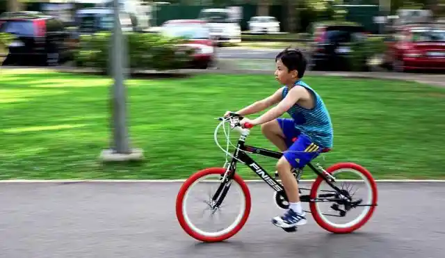 Boy On Bike