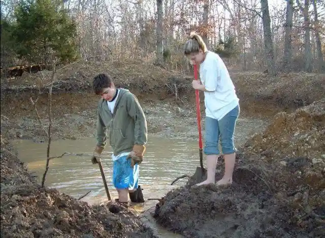 They reached the bedrock by digging into the spring by hand. Then they brought in bulldozers to dig out the lake itself and build a dock.