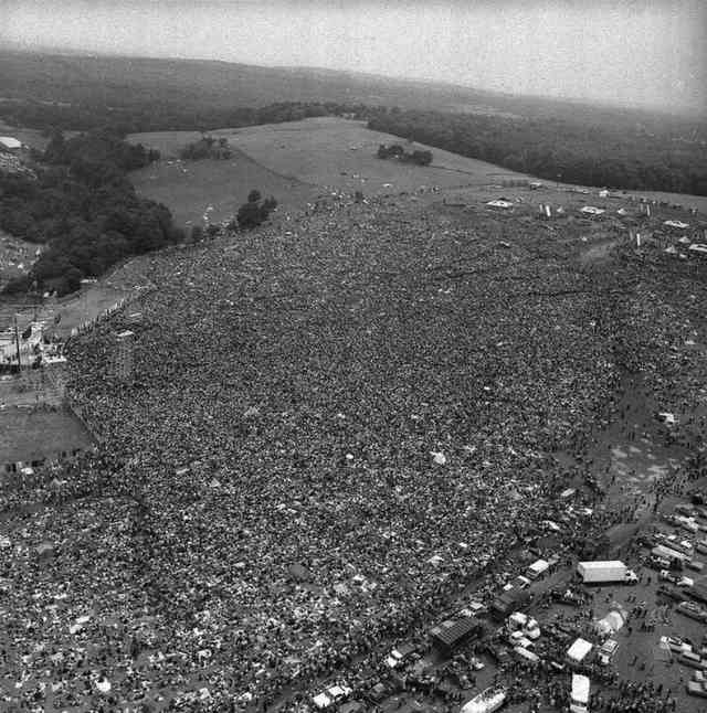 12. Massive crowds gather for Woodstock, 1969.