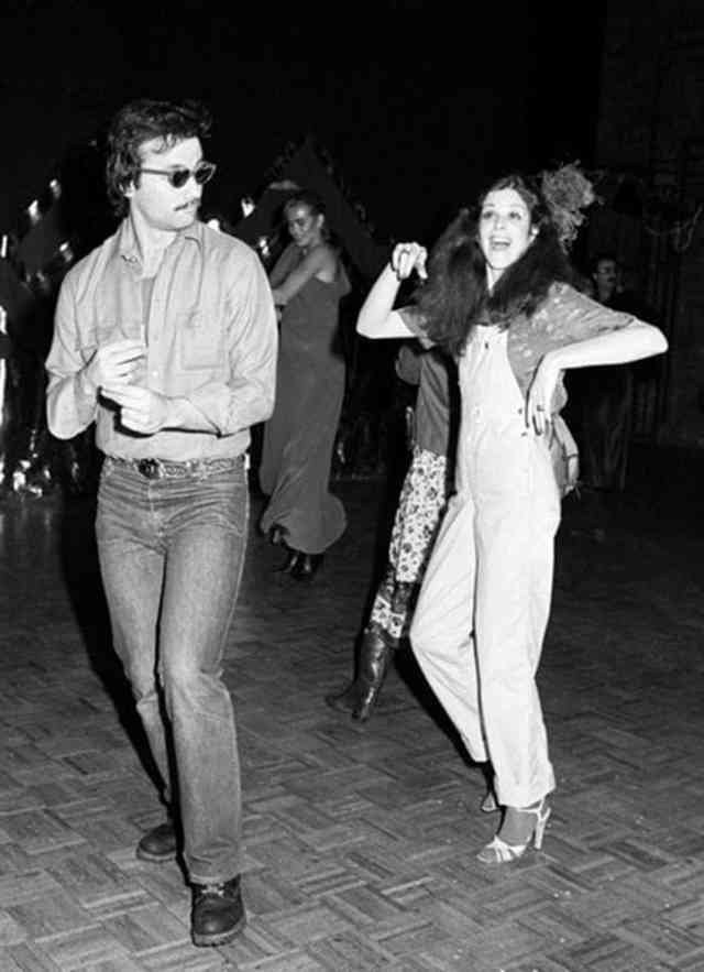 The club was also a hangout for Saturday Night Live showrunners at the time. Pictured here is Gilda Radner and Dan Akroyd partying it up.