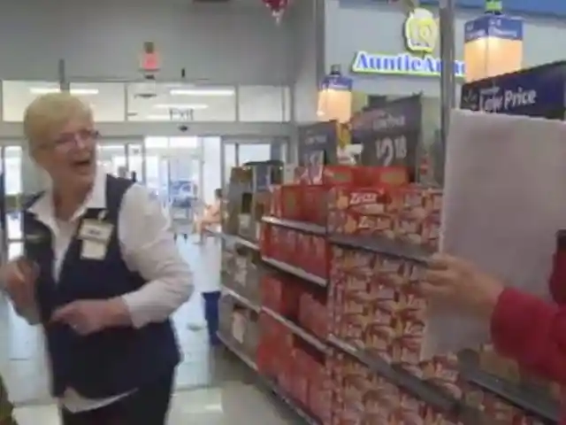 Walmart Greeter Realizes She's Being Stalked When She Sees Her Ex-Husband Holding This Sign
