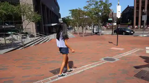 It's a beautiful day in Boston and you're strolling along the Freedom Trail when you see a man lying on the ground. It seems that his jaw has decayed however he's giving bizarre sounds. What will you do?