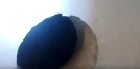 Man Hears Strange Noises In Wall, Looks Inside And Realizes Mistake