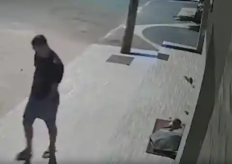 Surveillance Camera Captures Man's Gesture On The Street, It Goes Viral