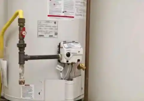 23. How often should a 2-resident house flush their water heater tank?