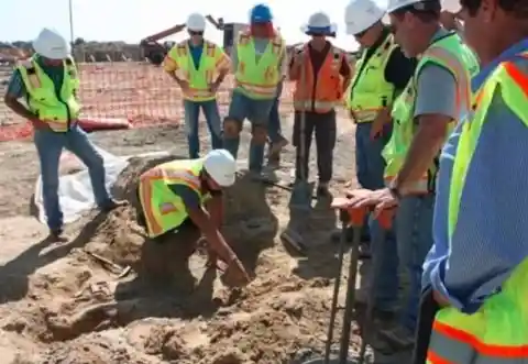 Construction Workers Stop In Their Tracks When They Make a Bizarre Discovery