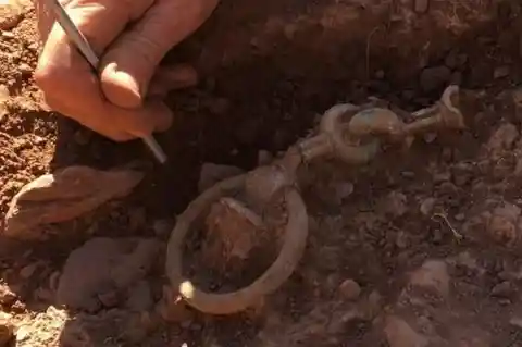Man Finds Old Buried Chain, Then Gut Tells Him To Keep Pulling