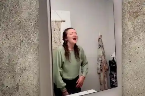 Woman Removes Bathroom Mirror, Uncovers Secret
