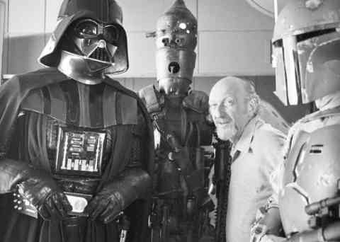 Director Irvin Kershner poses with some of the bad guys from The Empire Strikes Back.